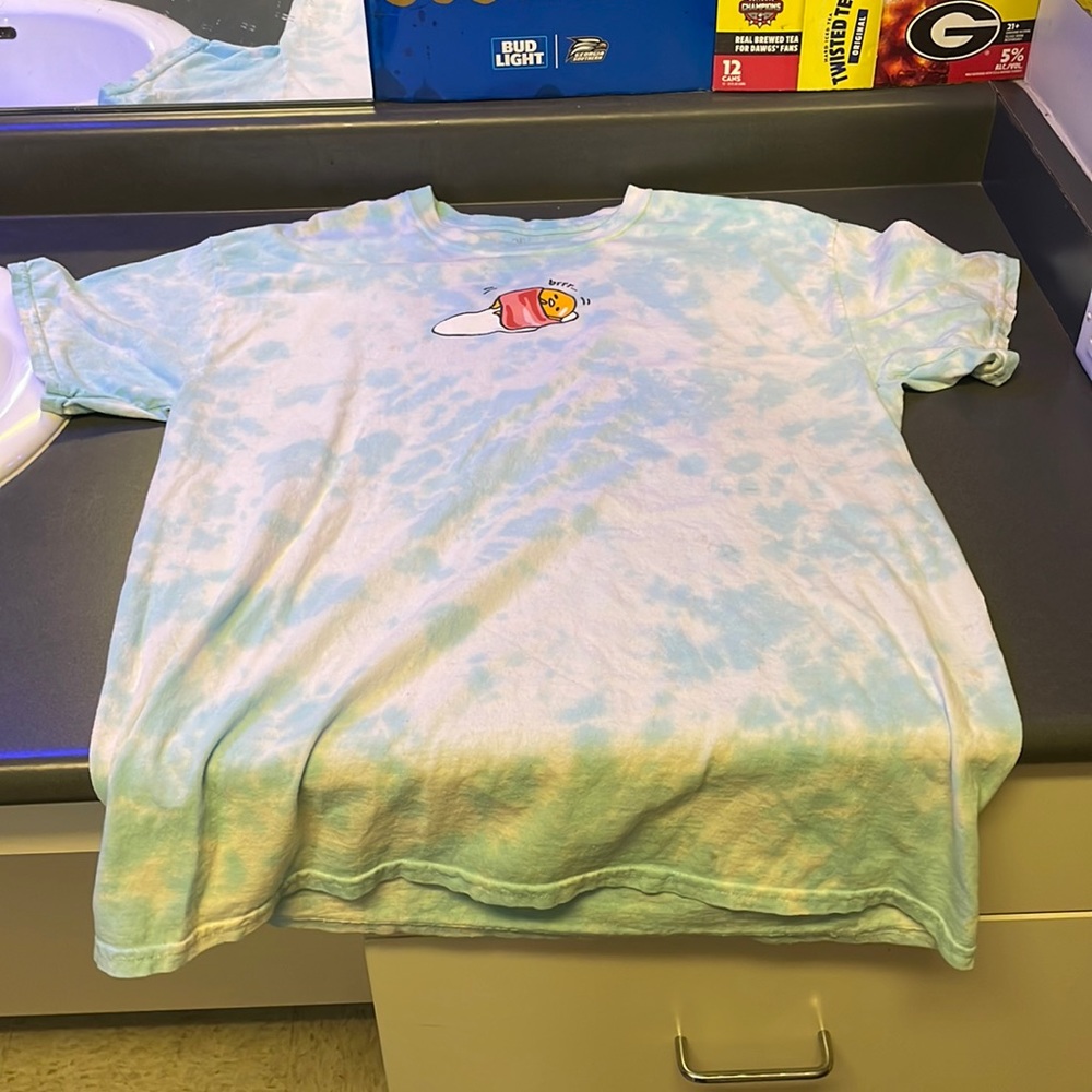 A blue and white tie die medium gudetama t-shirt